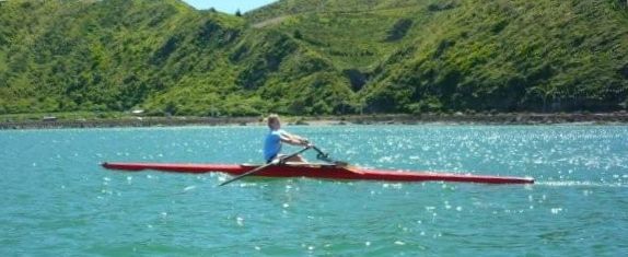 picture of red single scull